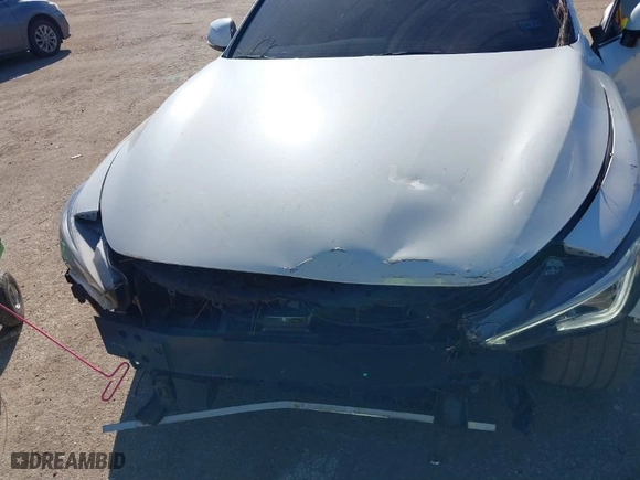 2018 Infiniti Q60 3.0t LUXE with VIN JN1EV7EK9JM340013, listed as a IAAI auction lot 41640006 with 101,989 mi miles. Bid and sale history available at carsss.com. Image 6.