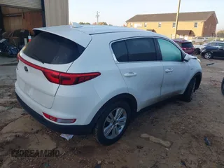 2018 Kia Sportage LX z VIN KNDPMCAC3J7394485, wystawiony jako IAAI lot #41106807 z przebiegiem 104 865 mil mil oraz . Historia ofert i sprzedaży dostępna na DreamBid. Obrazek 4.