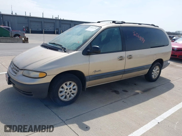 1999 Plymouth Voyager Grand SE z VIN 1P4GP44G0XB613853, wystawiony jako IAAI lot #42064199 z przebiegiem 175 050 mil mil oraz . Historia ofert i sprzedaży dostępna na DreamBid. Obrazek 2.