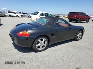 2000 Porsche Boxster с VIN WP0CA2983YU620909, выставлен на аукционе Copart как лот 58087035 с пробегом 99 845 миль миль и Чистый • Clean title. История ставок и продаж доступна на DreamBid. Изображение 3.
