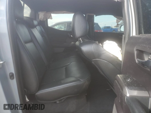 2021 Toyota Tacoma SR5 with VIN 3TMDZ5BN9MM099515, listed as a Copart auction lot 56687385 with 66,721 mi miles and Salvage title. Bid and sale history available at DreamBid. Image 10.