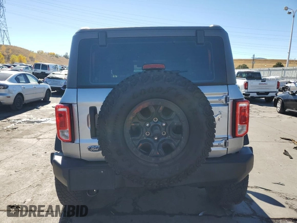 2023 Ford Bronco z VIN 1FMDE5CP7PLB26062, wystawiony jako Copart lot #76208154 z przebiegiem 17 688 mil mil oraz Szkoda całkowita • Salvage title. Historia ofert i sprzedaży dostępna na DreamBid. Obrazek 6.