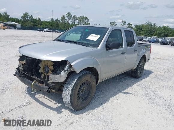 2017 Nissan Frontier Desert Runner with VIN 1N6DD0ER1HN704698, listed as a IAAI auction lot 42296137 with 166,783 mi miles and . Bid and sale history available at DreamBid. Image 2.