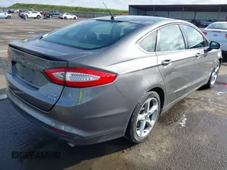 2013 Ford Fusion SE Hybrid with VIN 3FA6P0LU4DR267643, listed as a IAAI auction lot 41846681 with 148,002 mi miles. Bid and sale history available at carsss.com. Image 4.
