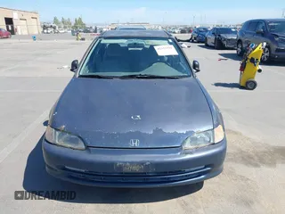 1994 Honda Civic DX z VIN JHMEG8646RS011787, wystawiony jako IAAI lot #42353591 z przebiegiem 279 381 mil mil oraz . Historia ofert i sprzedaży dostępna na DreamBid. Obrazek 11.