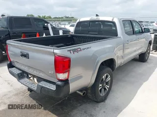 2017 Toyota Tacoma SR5 with VIN 3TMBZ5DN9HM011444, listed as a IAAI auction lot 42138388 with 133,857 mi miles and . Bid and sale history available at DreamBid. Image 4.