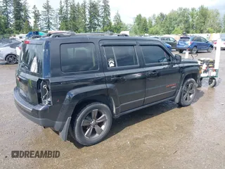 2016 Jeep Patriot Sport with VIN 1C4NJRBB5GD709029, listed as a IAAI auction lot 42303032 with 73,549 mi miles and . Bid and sale history available at DreamBid. Image 4.