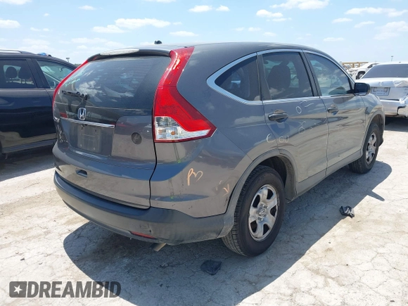 2013 Honda CR-V LX with VIN 3CZRM3H37DG708916, listed as a IAAI auction lot 42450090 with 118,002 mi miles and . Bid and sale history available at DreamBid. Image 4.
