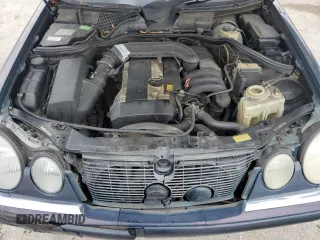 1997 Mercedes-Benz E-Class with VIN WDBJF55F4VJ025769, listed as a Copart auction lot 73460164 with 0 mi miles and Salvage Title. Bid and sale history available at carsss.com. Image 12.