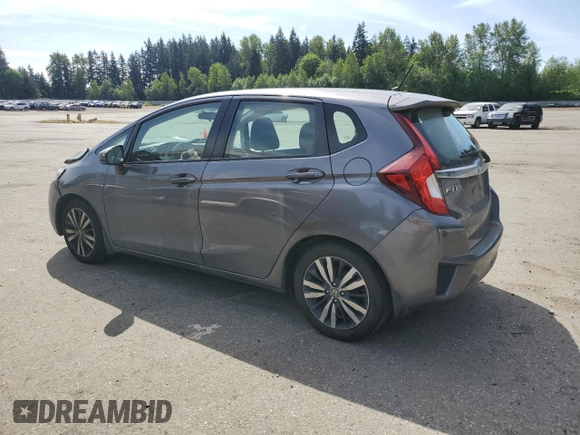 2015 Honda Fit EX-L with VIN 3HGGK5H80FM767970, listed as a Copart auction lot 55866075 with 64,435 mi miles and Salvage Title. Bid and sale history available at DreamBid. Image 2.