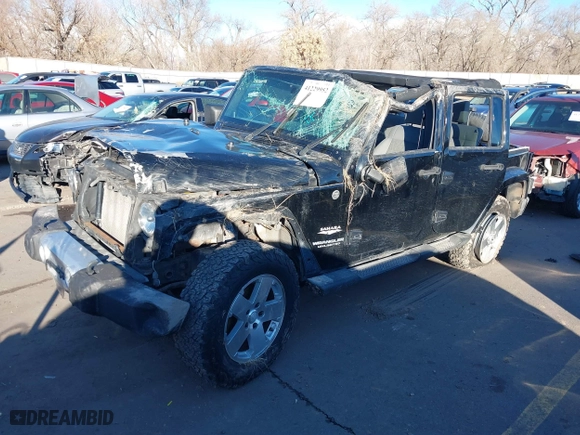 2008 Jeep Wrangler Unlimited Sahara with VIN 1J8GA59188L542812, listed as a IAAI auction lot 41229952 with 127,889 mi miles. Bid and sale history available at carsss.com. Image 18.