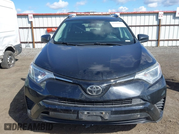 2018 Toyota RAV4 LE with VIN 2T3BFREV2JW749735, listed as a IAAI auction lot 41998068 with 112,468 mi miles. Bid and sale history available at carsss.com. Image 12.