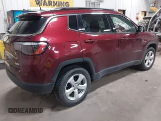 2021 Jeep Compass Altitude with VIN 3C4NJDBB8MT547261, listed as a IAAI auction lot 42066421 with 99,188 mi miles and . Bid and sale history available at DreamBid. Image 4.