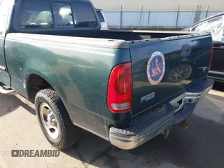 2002 Ford F-150 XL with VIN 1FTRX17L42NA52360, listed as a IAAI auction lot 41886697 with 121,346 mi miles. Bid and sale history available at carsss.com. Image 13.