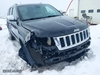 2011 Jeep Grand Cherokee Overland with VIN 1J4RR6GT5BC604784, listed as a IAAI auction lot 41515626 with 66,654 mi miles. Bid and sale history available at carsss.com. Image 6.