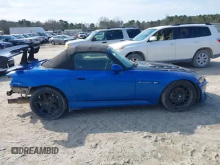 2002 Honda S2000 z VIN JHMAP11452T009221, wystawiony jako IAAI lot #38811161 z przebiegiem 67 818 mil mil oraz . Historia ofert i sprzedaży dostępna na DreamBid. Obrazek 13.