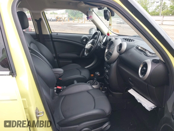 2012 MINI Countryman S z VIN WMWZC3C59CWL82955, wystawiony jako IAAI lot #42237702 z przebiegiem 61 903 mil mil oraz . Historia ofert i sprzedaży dostępna na DreamBid. Obrazek 5.