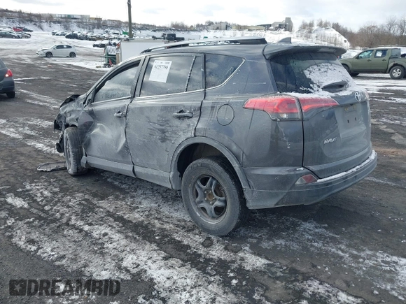 2017 Toyota RAV4 LE with VIN JTMZFREV9HJ119332, listed as a IAAI auction lot 41257790 with 94,992 mi miles and . Bid and sale history available at carsss.com. Image 3.
