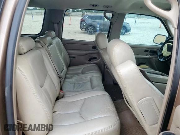 2004 Chevrolet Suburban LT z VIN 1GNEC16Z44R302179, wystawiony jako Copart lot #57956605 z przebiegiem 291 567 mil mil oraz Szkoda całkowita • Salvage title. Historia ofert i sprzedaży dostępna na DreamBid. Obrazek 11.