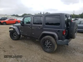 2018 Jeep Wrangler JK Unlimited Sahara with VIN 1C4HJWEG7JL909023, listed as a Copart auction lot 72774404 with 106,801 mi miles and Salvage Title. Bid and sale history available at carsss.com. Image 2.