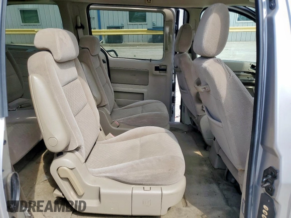 2004 Ford Freestar SEL z VIN 2FMZA52214BA84555, wystawiony jako Copart lot #54569535 z przebiegiem Nie podano mil oraz Szkoda całkowita • Salvage title. Historia ofert i sprzedaży dostępna na DreamBid. Obrazek 11.