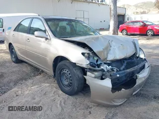 2004 Toyota Camry LE with VIN 4T1BE32KX4U299386, listed as a IAAI auction lot 41852224 with 223,949 mi miles. Bid and sale history available at carsss.com. Image 1.