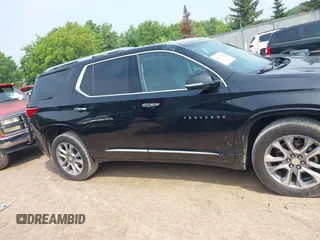 2019 Chevrolet Traverse Premier with VIN 1GNEVKKW1KJ282531, listed as a IAAI auction lot 42408361 with 95,464 mi miles and . Bid and sale history available at DreamBid. Image 13.