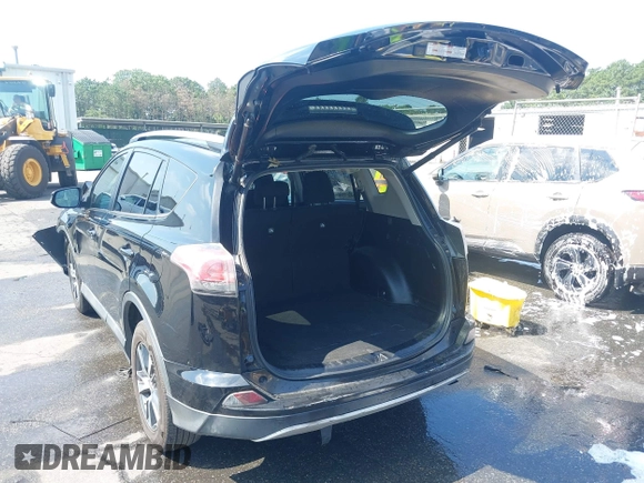 2016 Toyota RAV4 XLE with VIN 2T3RFREV9GW458057, listed as a IAAI auction lot 42651373 with 119,750 mi miles and . Bid and sale history available at DreamBid. Image 3.