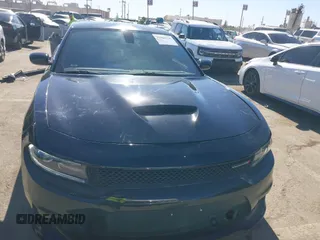2018 Dodge Charger SXT Plus with VIN 2C3CDXHG9JH281387, listed as a IAAI auction lot 41402210 with 132,881 mi miles and . Bid and sale history available at carsss.com. Image 13.