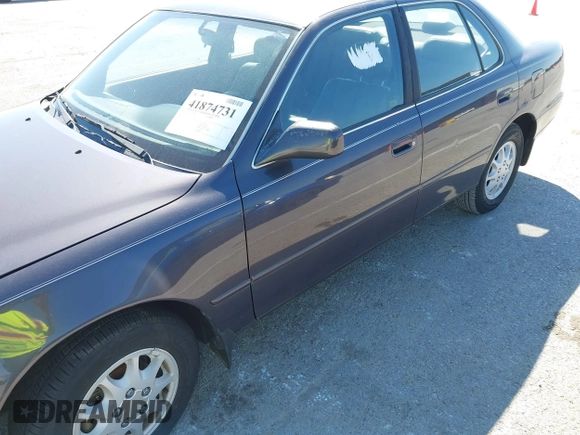 1996 Toyota Camry DX with VIN 4T1BG12K8TU915891, listed as a IAAI auction lot 41874731 with 57,564 mi miles. Bid and sale history available at carsss.com. Image 6.