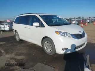 2016 Toyota Sienna XLE with VIN 5TDYK3DC9GS755187, listed as a IAAI auction lot 41344816 with 106,694 mi miles. Bid and sale history available at carsss.com. Image 1.