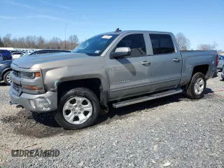 2017 Chevrolet Silverado 1500 LT with VIN 3GCUKREC0HG335785, listed as a Copart auction lot 51456305 with 104,614 mi miles and Salvage Title. Bid and sale history available at DreamBid. Image 1.