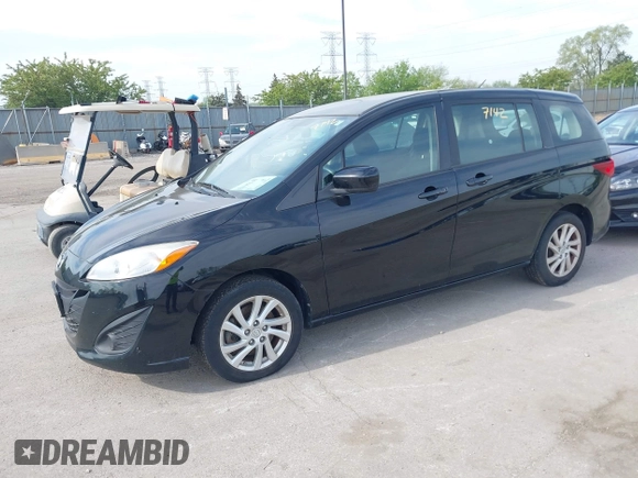 2012 Mazda 5 Sport with VIN JM1CW2BL3C0109930, listed as a IAAI auction lot 42197142 with 154,913 mi miles. Bid and sale history available at carsss.com. Image 2.