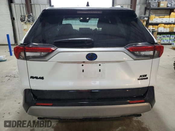 2024 Toyota RAV4 Hybrid XSE with VIN 2T3E6RFV8RW082127, listed as a Copart auction lot 49457035 with 5,544 mi miles and Salvage Title. Bid and sale history available at DreamBid. Image 6.