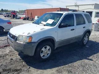 2002 Ford Escape XLT Choice with VIN 1FMYU03162KC30365, listed as a IAAI auction lot 41887421 with 364,136 mi miles. Bid and sale history available at carsss.com. Image 2.