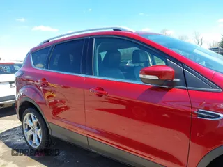 2017 Ford Escape Titanium with VIN 1FMCU9J96HUA68094, listed as a IAAI auction lot 42043893 with 85,893 mi miles. Bid and sale history available at carsss.com. Image 12.