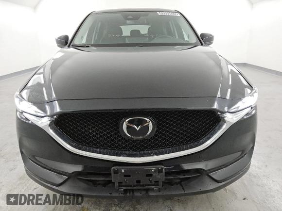 2021 Mazda CX-5 Grand Touring with VIN JM3KFBDM6M0487606, listed as a Copart auction lot 45399655 with 25,241 mi miles and Clean Title. Bid and sale history available at DreamBid. Image 5.