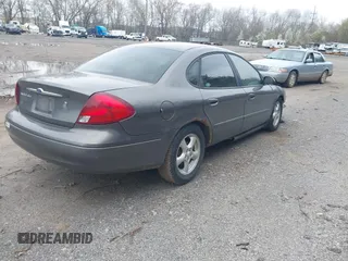 2003 Ford Taurus SES Standard with VIN 1FAFP55U43A261182, listed as a IAAI auction lot 42020172 with 118,000 mi miles. Bid and sale history available at carsss.com. Image 4.
