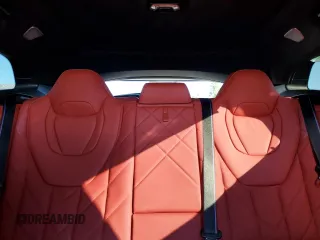 2023 BMW XM z VIN 5YM23CS08P9R97700, wystawiony jako Copart lot #79049744 z przebiegiem Nie podano mil oraz Szkody całkowita. Historia ofert i sprzedaży dostępna na DreamBid. Obrazek 10.