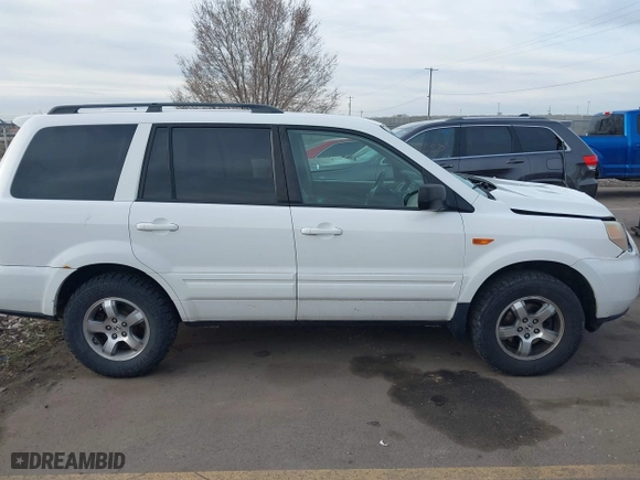 2006 Honda Pilot EX-L with VIN 2HKYF18576H517590, listed as a IAAI auction lot 41802601 with 233,833 mi miles. Bid and sale history available at carsss.com. Image 13.