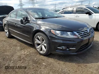 2014 Volkswagen CC R-Line with VIN WVWBN7AN8EE530773, listed as a Copart auction lot 63283844 with 117,187 mi miles and Salvage Title. Bid and sale history available at carsss.com. Image 4.
