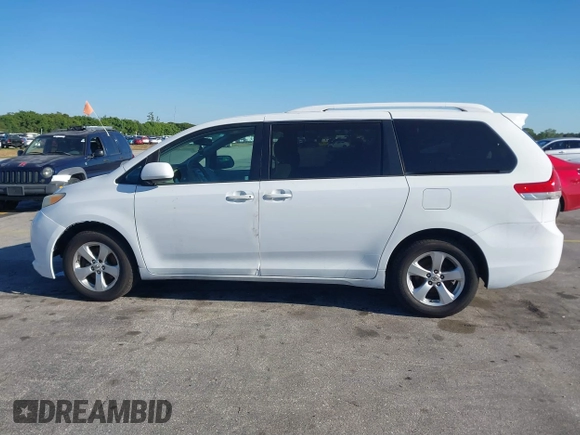 2012 Toyota Sienna with VIN 5TDKA3DC5CS011220, listed as a IAAI auction lot 41770493 with 199,266 mi miles and . Bid and sale history available at DreamBid. Image 14.