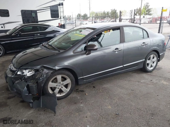 2010 Honda Civic Sdn LX-S with VIN 19XFA1F63AE065877, listed as a IAAI auction lot 41884982 with 195,939 mi miles. Bid and sale history available at carsss.com. Image 2.
