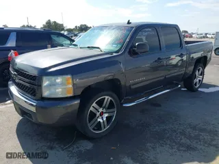 2011 Chevrolet Silverado 1500 LS with VIN 3GCPCREA2BG299534, listed as a IAAI auction lot 40703559 with 148,717 mi miles. Bid and sale history available at carsss.com. Image 2.