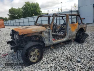 2009 Jeep Wrangler Unlimited X с VIN 1J8GA39199L762093, выставлен на аукционе Copart как лот 51063365 с пробегом Не указан миль и На запчасти • Non repairable. История ставок и продаж доступна на DreamBid. Изображение 1.