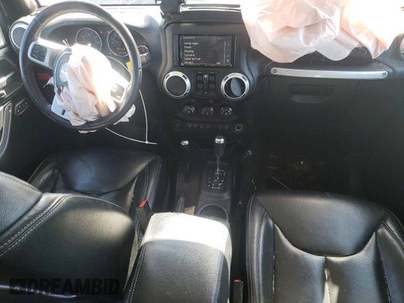 2016 Jeep Wrangler Unlimited Rubicon Hard Rock with VIN 1C4BJWFG9GL209484, listed as a Copart auction lot 87815475 with 85,729 mi miles and Salvage Title. Bid and sale history available at carsss.com. Image 8.