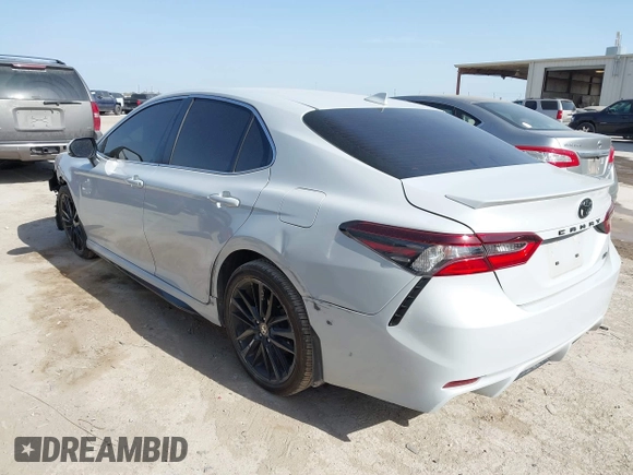2023 Toyota Camry SE z VIN 4T1G11AK2PU128367, wystawiony jako IAAI lot #41699516 z przebiegiem 27 270 mil mil oraz . Historia ofert i sprzedaży dostępna na DreamBid. Obrazek 3.