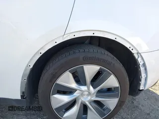 2023 Tesla Model Y Long Range z VIN 7SAYGDEE5PF765326, wystawiony jako IAAI lot #41757113 z przebiegiem 10 461 mil mil oraz . Historia ofert i sprzedaży dostępna na DreamBid. Obrazek 24.