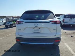 2017 Mazda CX-9 Grand Touring with VIN JM3TCBDY3H0132351, listed as a IAAI auction lot 42346910 with 124,990 mi miles and . Bid and sale history available at DreamBid. Image 16.