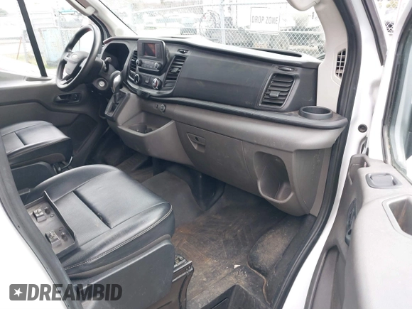 2020 Ford Transit Cargo with VIN 1FTBR1C8XLKA14891, listed as a IAAI auction lot 41435923 with 51,891 mi miles and . Bid and sale history available at DreamBid. Image 5.